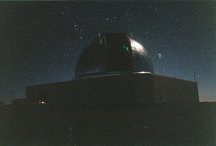 Moonlit view of IRTF dome, plus the Pleiades