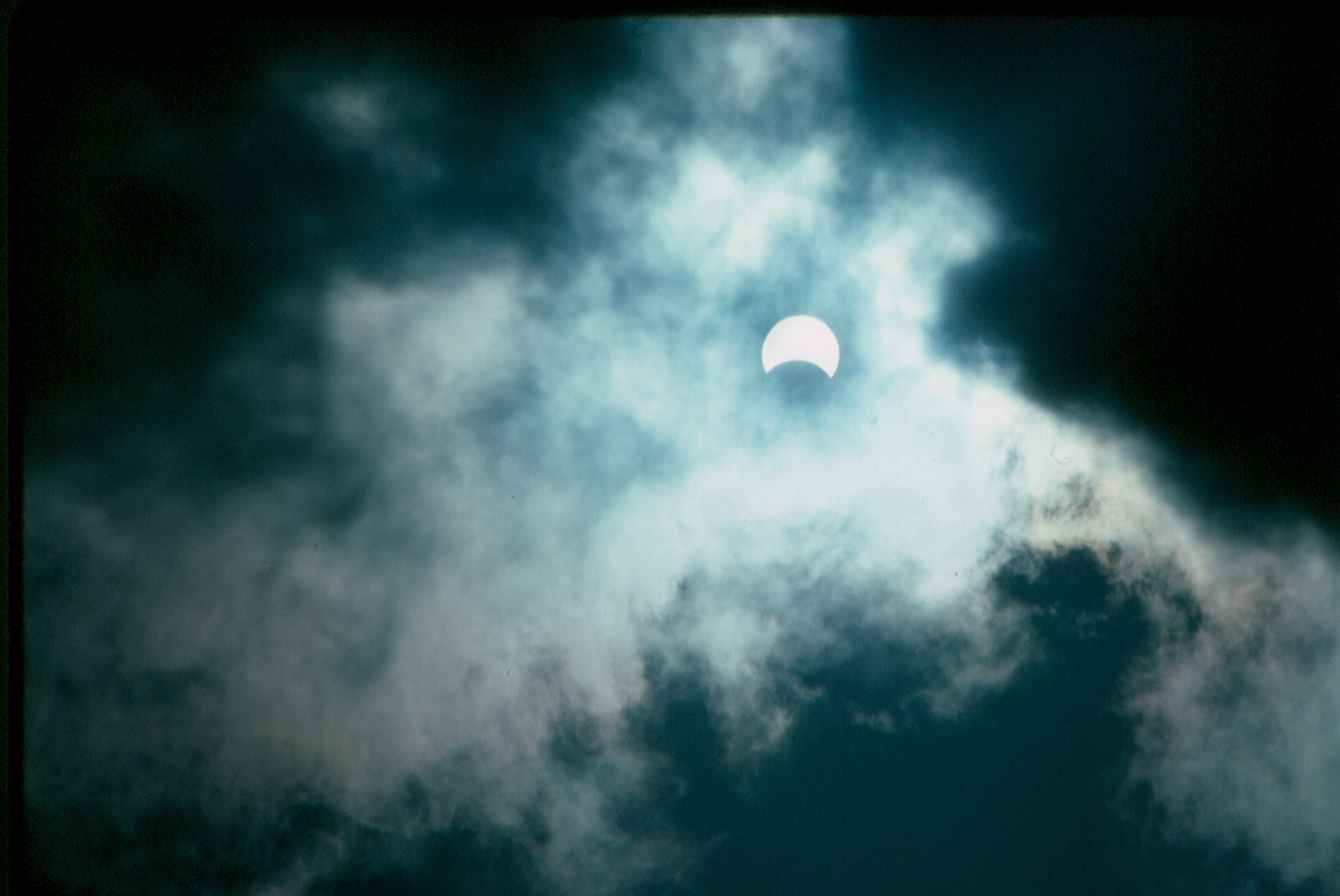 Solar eclipse through clouds